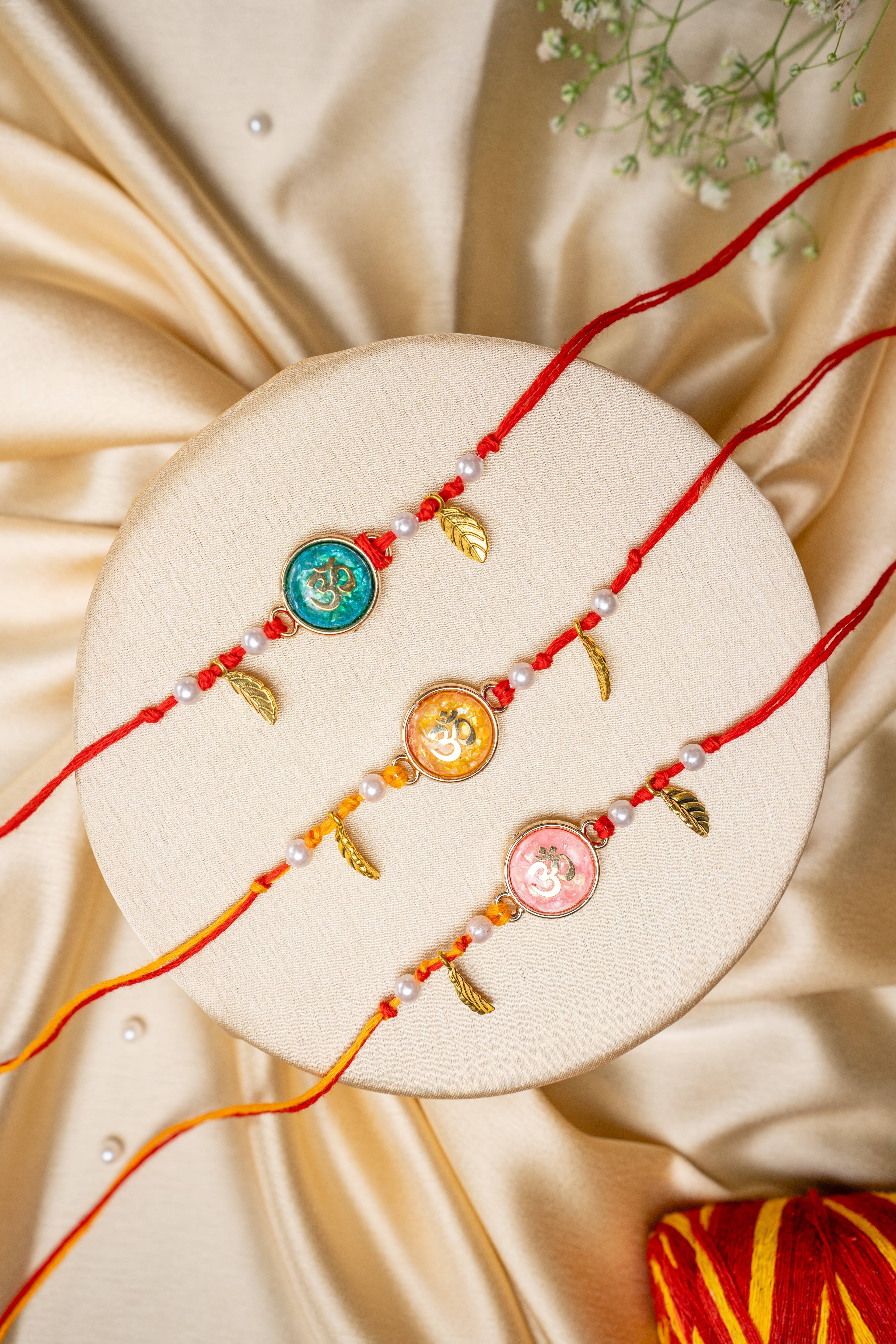 Om handwork bead rakhi