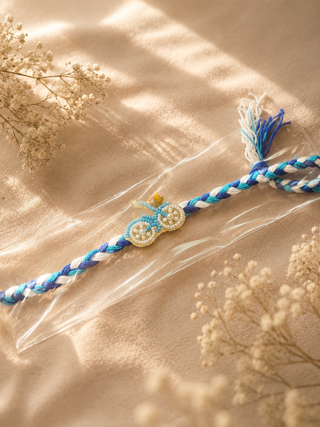 Cycle beadwork rakhi